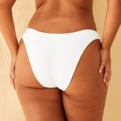 Women's Extra High Leg Eyelet Low-Rise Extra Cheeky Bikini Bottom - Wild Fable™ -Selfie Leslie GUEST 18b016bc 6c93 4100 b5eb 48b96f1a45fe