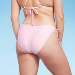 Women's Side-Tie Scoop Front High Leg Cheeky Bikini Bottom - Wild Fable™ Light Pink Lurex -Selfie Leslie GUEST faf96daf b975 4985 86e7 020de1810539